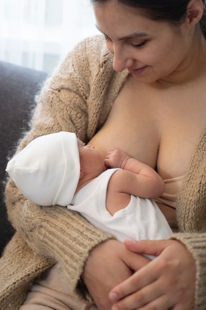 Woman breast feeding her child