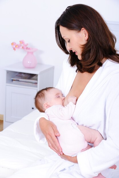 Woman breastfeeding baby