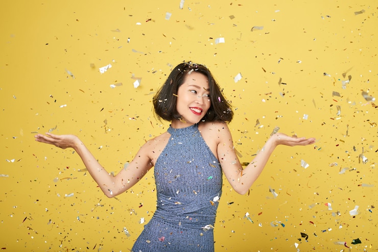 免費 Photo 穿著鮮<unk>糖果的女人
