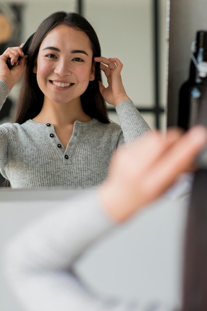 Woman brushing hair