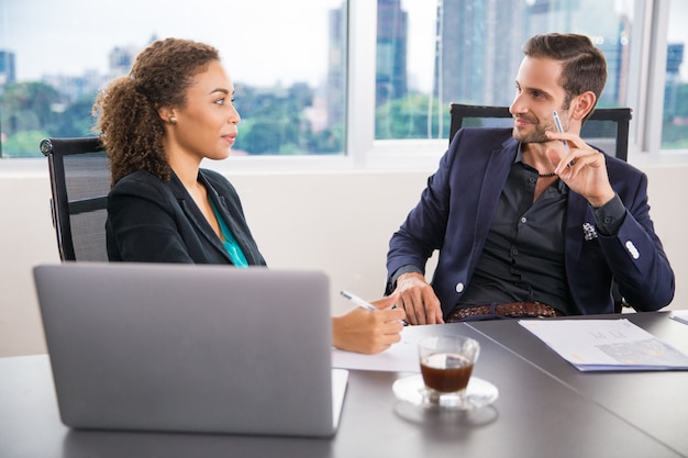 Woman and businessman talking