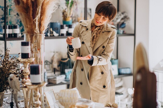 Woman buying stuff in a decoration store