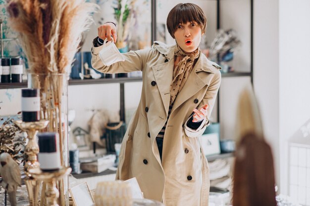 Woman buying stuff in a decoration store