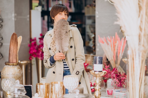 Woman buying stuff in a decoration store