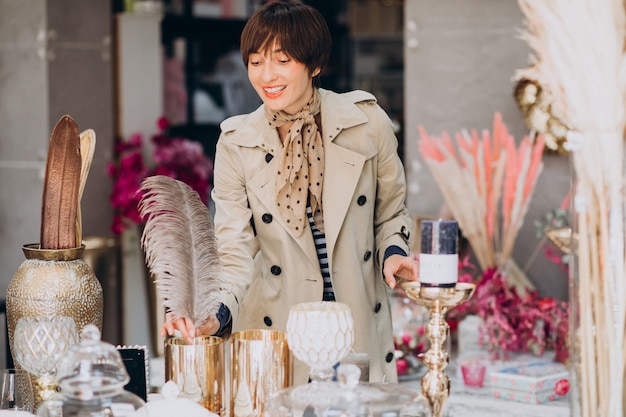 Woman buying stuff in a decoration store