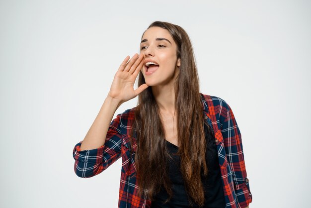 woman calling for someone, shouting on distance