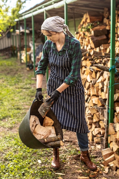 Woman carring fire wood