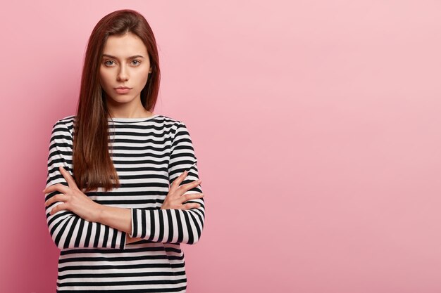 Woman in casual clothes posing