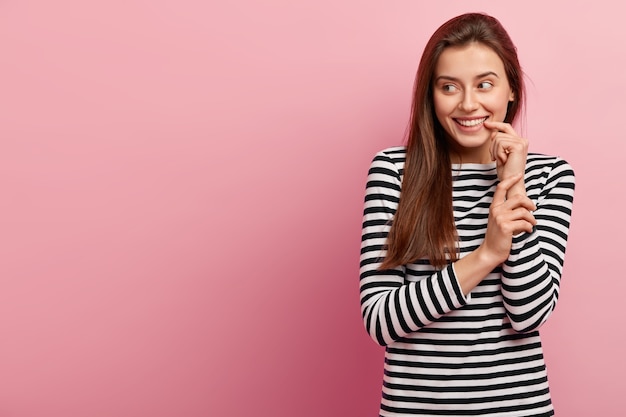 Woman in casual clothes posing