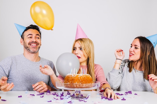 Woman celebrating birthday with her friends
