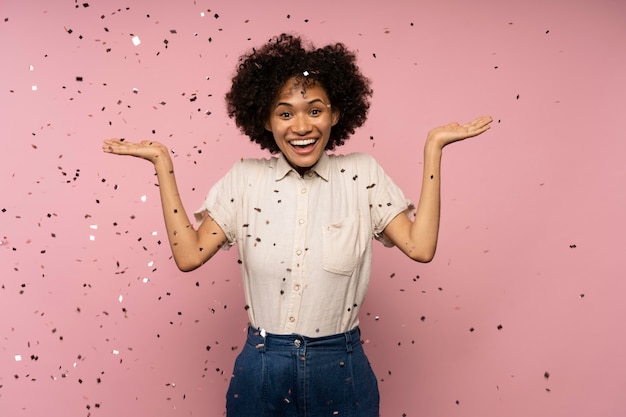 Woman celebrating with confetti