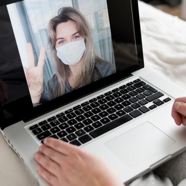 Woman chatting with friend on videocall