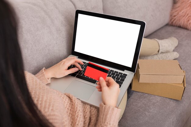 woman checking her laptop for cyber monday sales