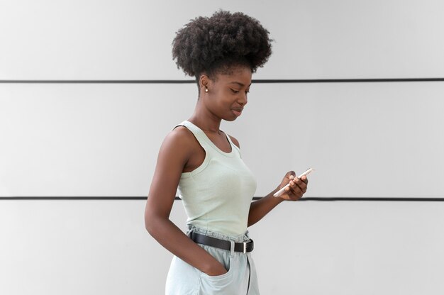 Woman checking her smartphone for notifications