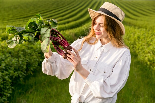 Woman checking vegetable