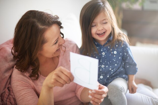 Woman and child playing together