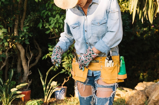 Woman choosing tools from bag