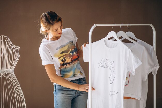 Free photo woman chosing a white shirt