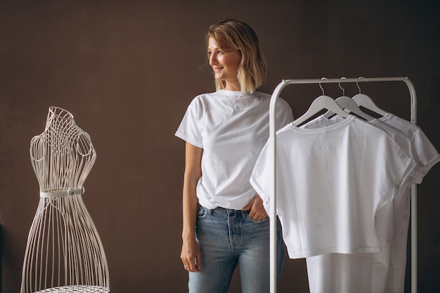 Woman chosing a white shirt