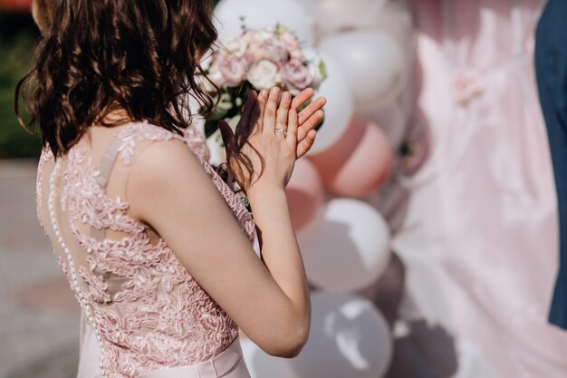 Woman clapping on the ceremony