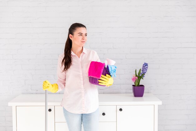 Woman cleaning her home