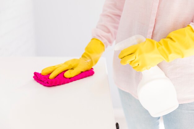 Woman cleaning her home