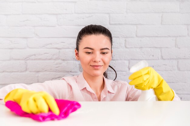 Woman cleaning her home