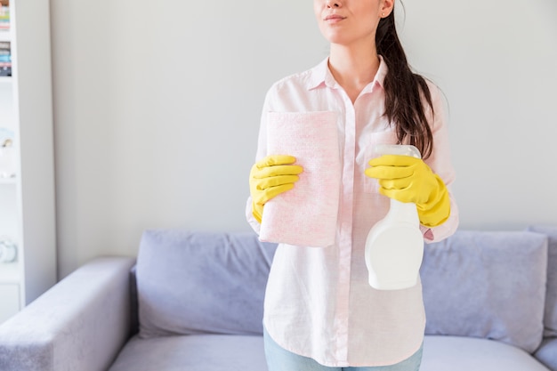 Woman cleaning her home