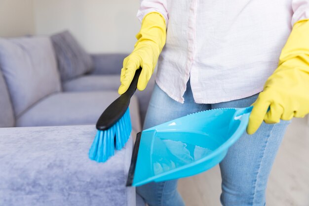 Woman cleaning her home