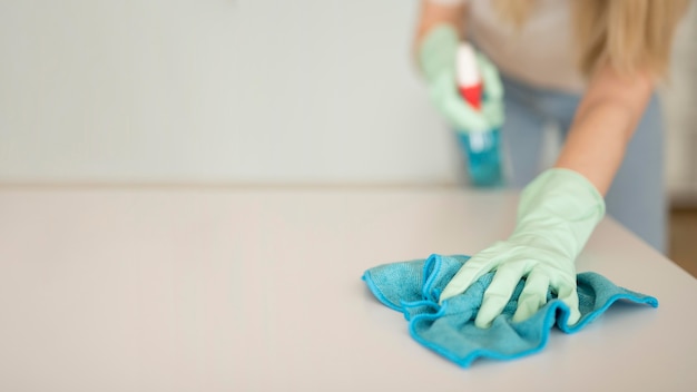 Woman cleaning surface