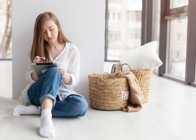 Woman coming up with new ideas for a blog indoors with copy space