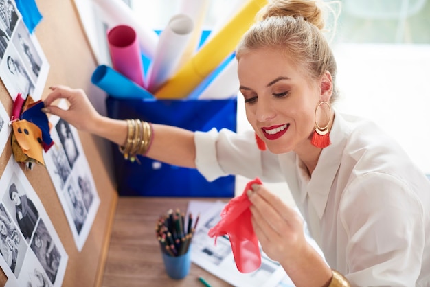 Woman comparing each colorful material