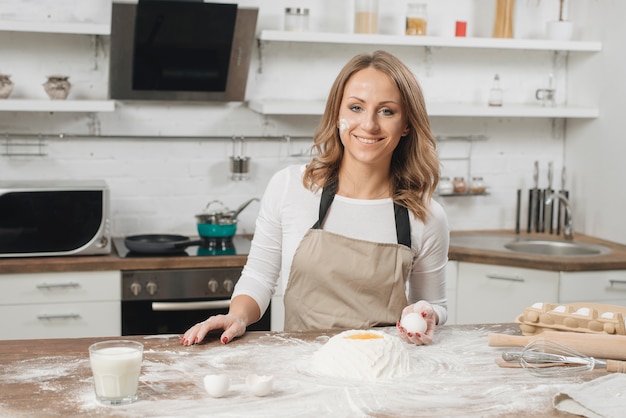 Woman cooking cake