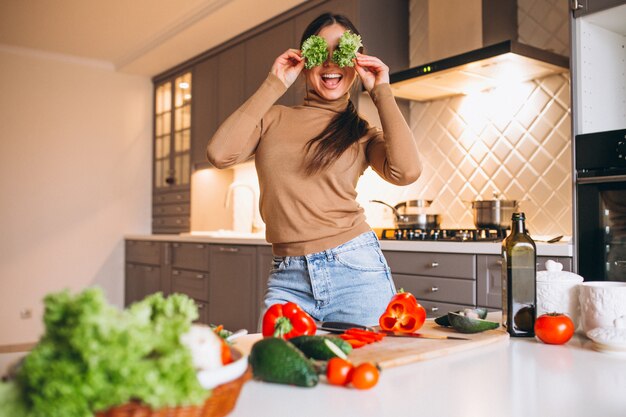 Woman cooking at kitchen