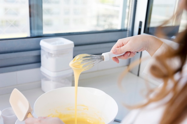 Woman cooking in kitchen