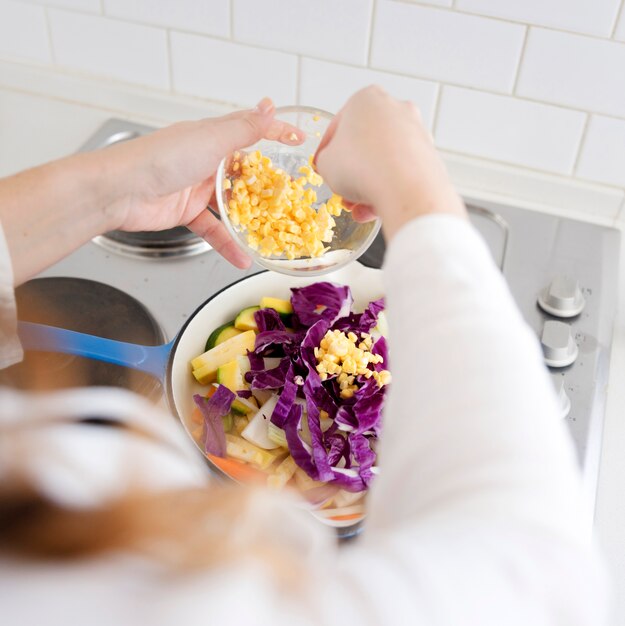 Woman cooking in kitchen