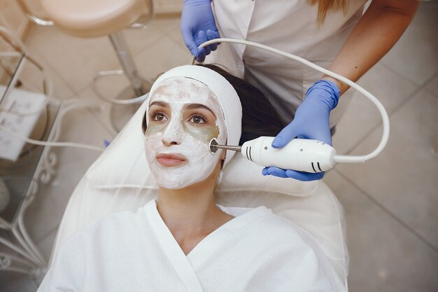 Woman in cosmetology studio on a procedures