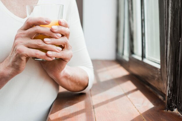 Woman couple having a juice