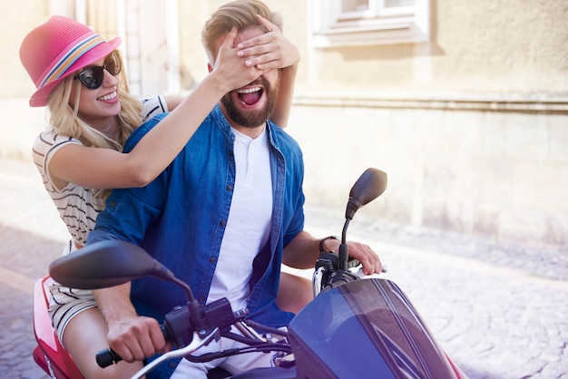 Woman covering eyes of her boyfriend