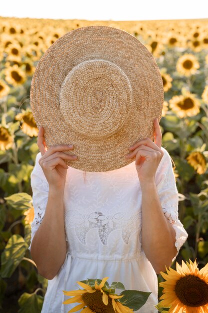 Woman covering face with