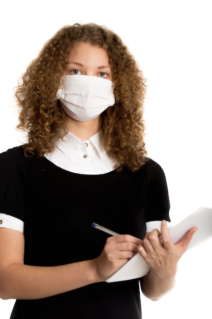 Woman covering her face with a mask