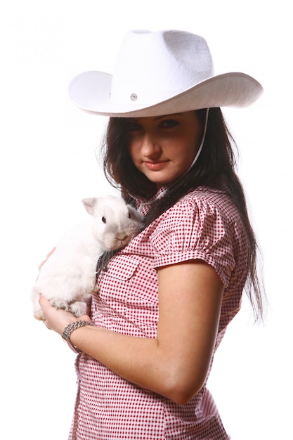 woman cowgirl with bunny