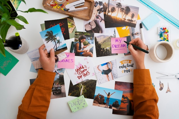 Free photo woman creating inspiring vision board top view