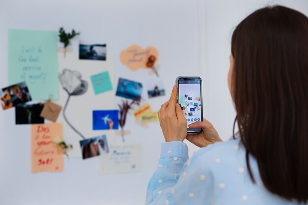 Woman creating their own vision board