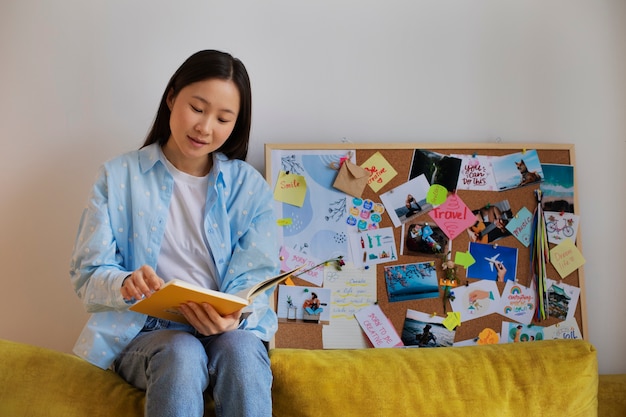 Free photo woman creating their own vision board