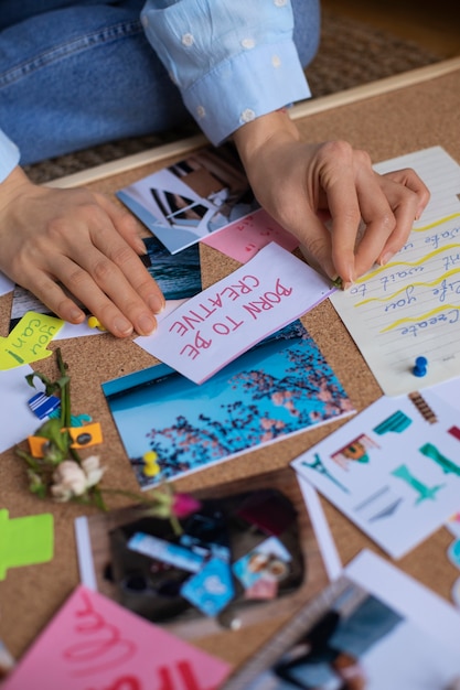 Woman creating their own vision board