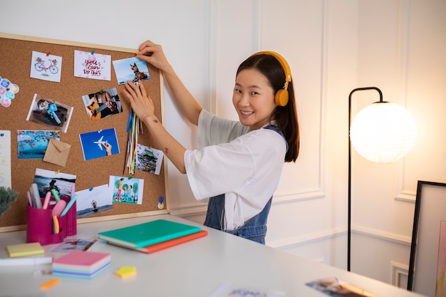 Free photo woman creating their own vision board