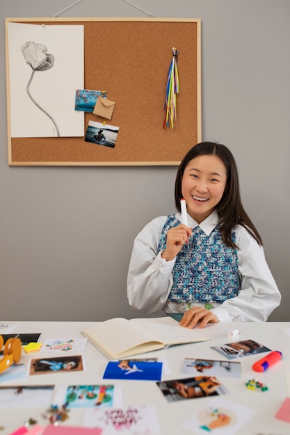 Woman creating their own vision board