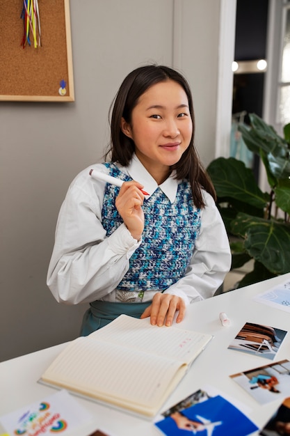 woman creating their own vision board