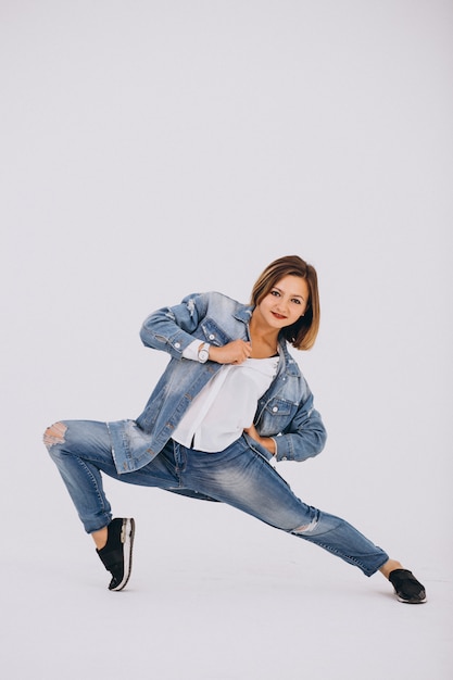 Woman dancer posing in studio